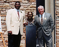 Jackie Slater (left) stands with John Robinson