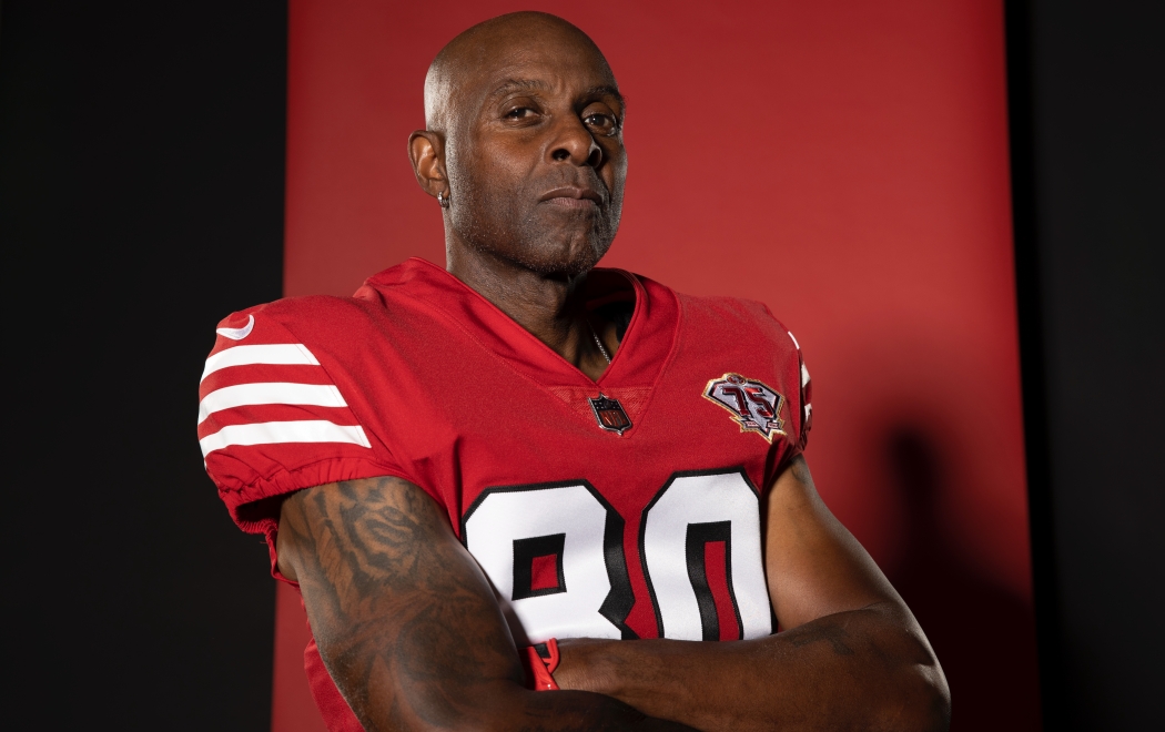 Rice Evokes Memories While Modeling 49ers Throwback Jersey