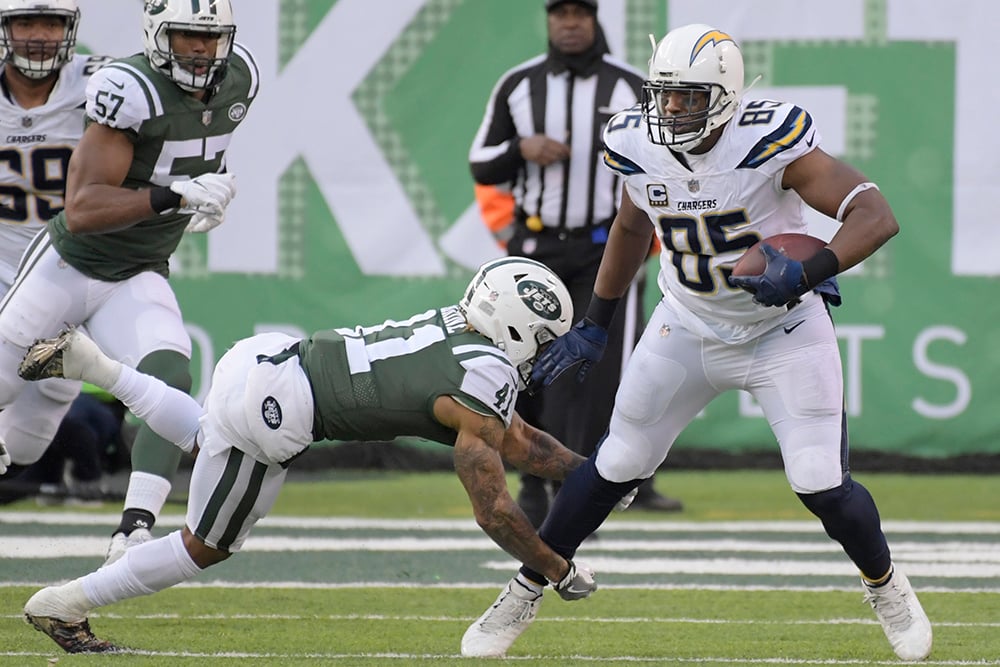 Hall of Fame tight end Antonio Gates carries the football.