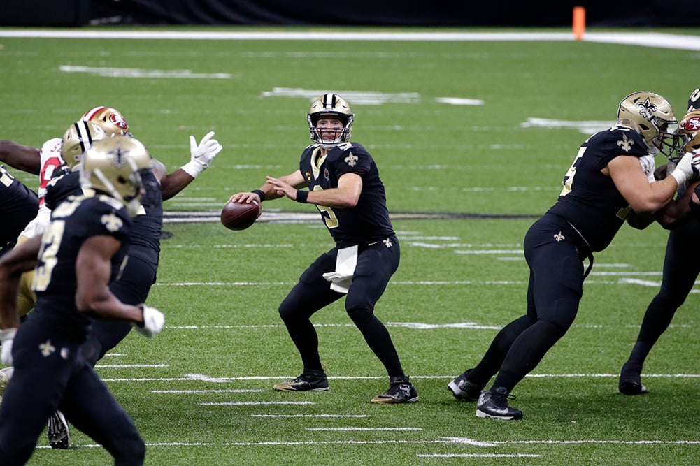 New Orleans Saints quarterback Drew Brees (9) drops back to pass in the first half of an NFL football game against the San Francisco 49ers in New Orleans, Sunday, Nov. 15, 2020. (AP Photo/Butch Dill)