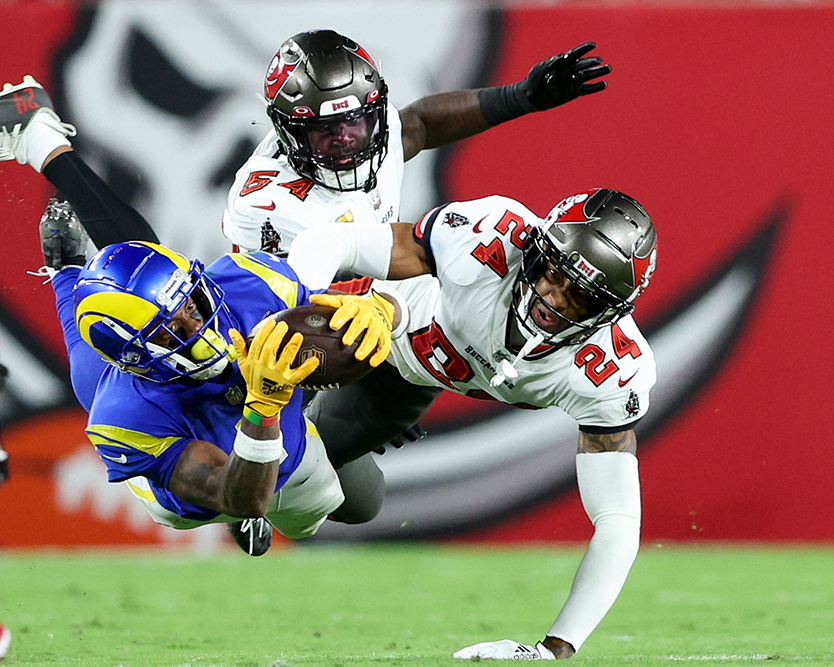 Honorable Mention, Action – Photo by Nathan Ray Seebeck, USA Today Sports, “Look Out,” Los Angeles Rams at Tampa Bay Buccaneers, Nov. 6, 2022.