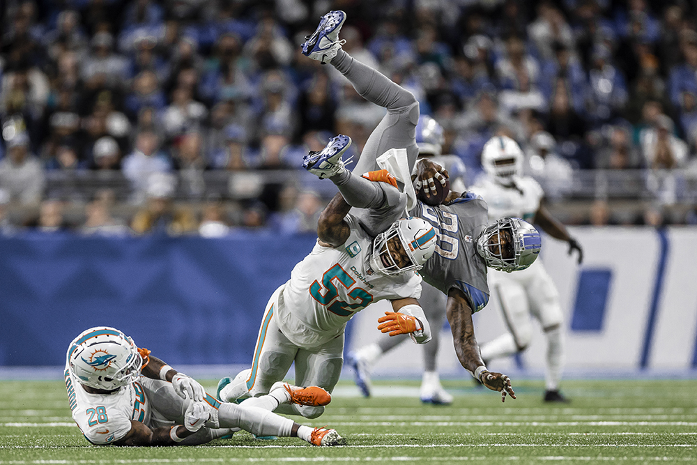 First Place, Action – Photo by Brennan Asplen, Miami Dolphins, “When Worlds Collide,” Miami Dolphins at Detroit Lions, Oct. 30, 2022.
